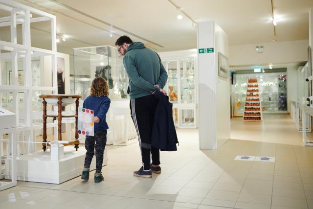 A man and child in the V&A Wedgwood Collection 
