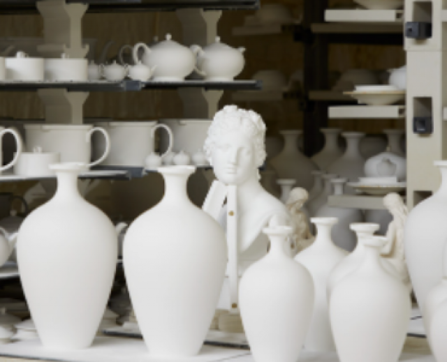 Venus bust and vases in kiln