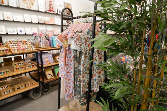 Clothing in Josiah & Co Store with plant