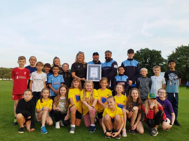 Wedgwood Cricket Club group picture with award