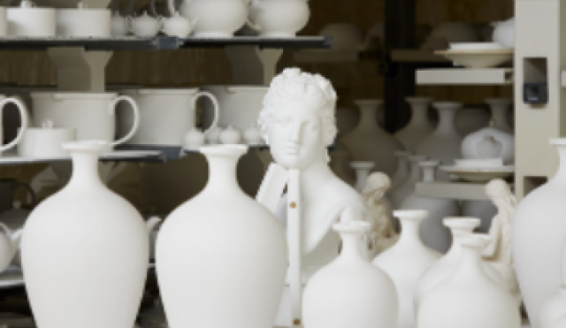 Venus bust and vases in kiln