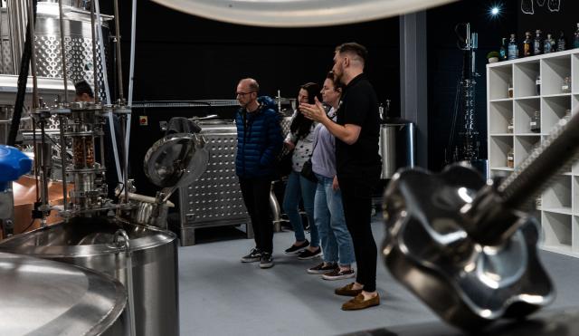 Guests on distillery tour