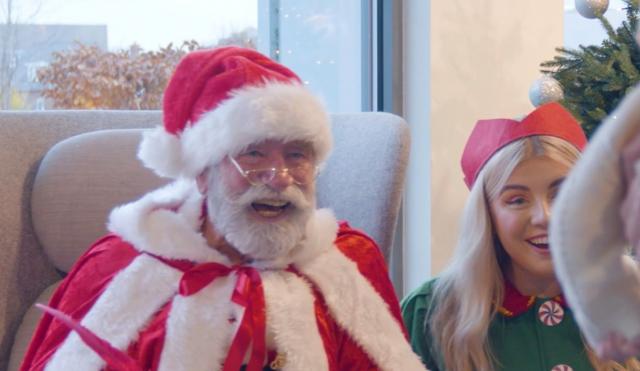 Santa and elf actors