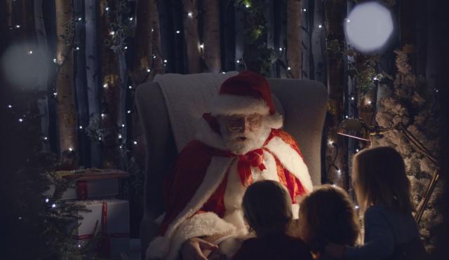 Santa actor reading story to children