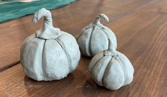 Three ceramic pumpkins
