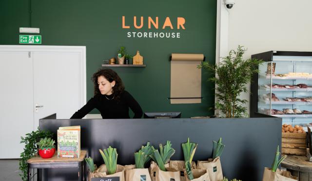 Cashier at Lunar Storehouse Till Point