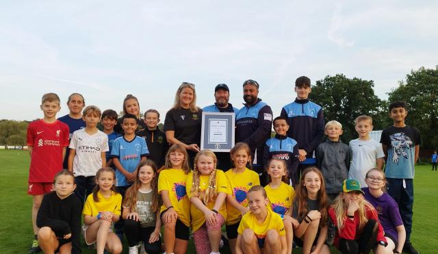 Wedgwood Cricket Club group picture with award